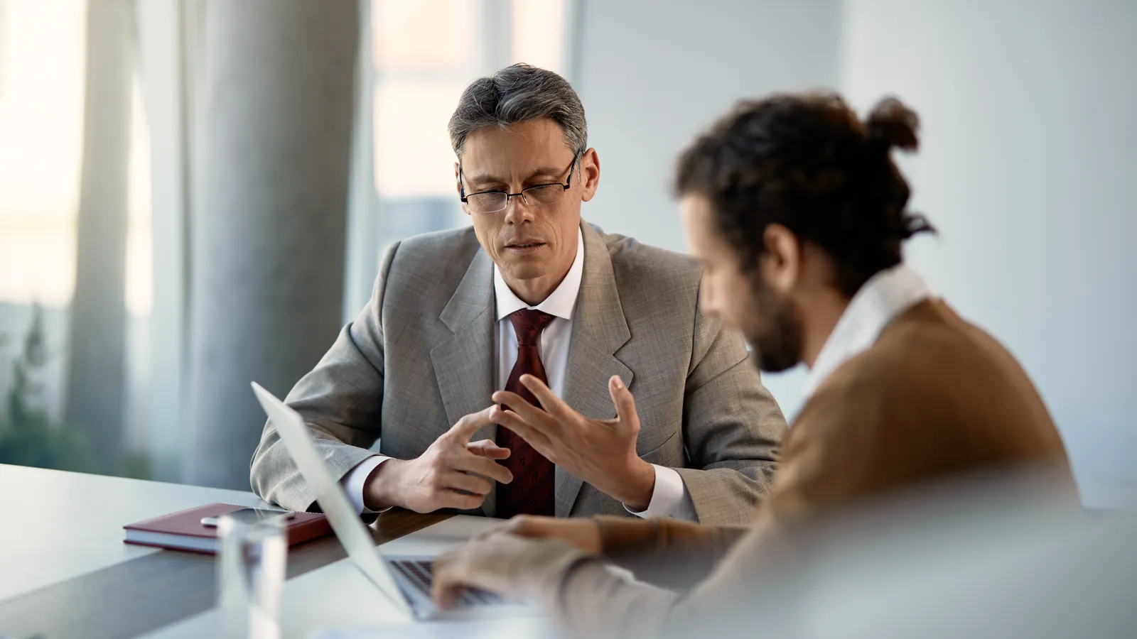 Consultant and client in a face-to-face consultation
