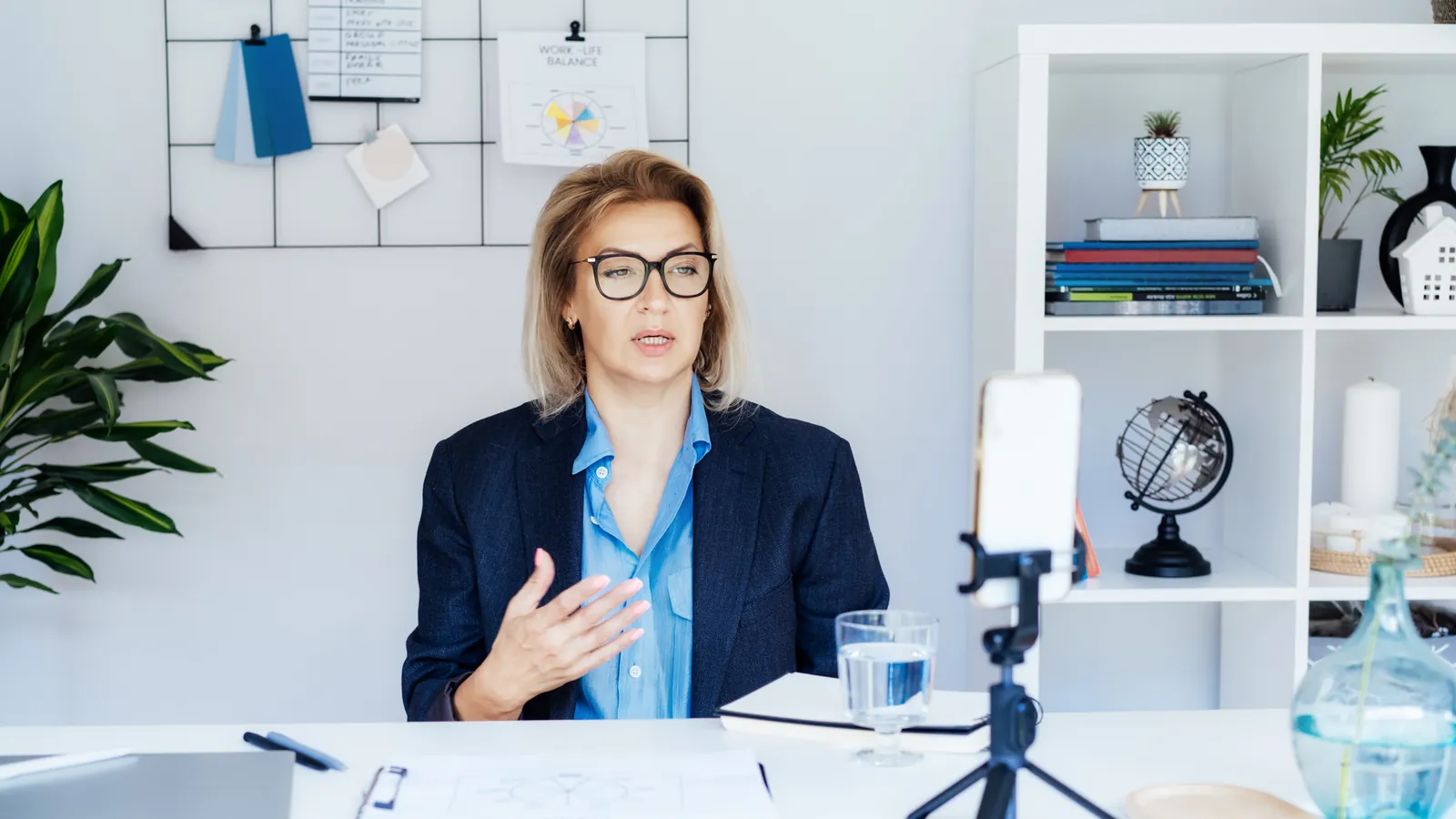 Business owner recording a video to boost her online visibility